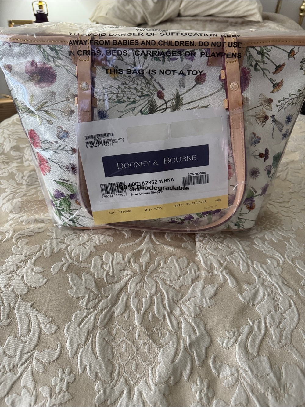 Dooney & Bourke White Floral Tote with Pink Trim